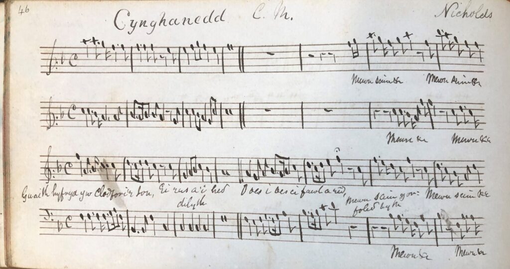 Black and white image of handwritten music scores 