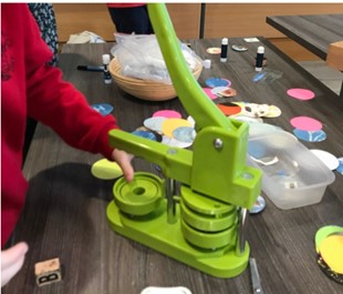 An image of a badge maker